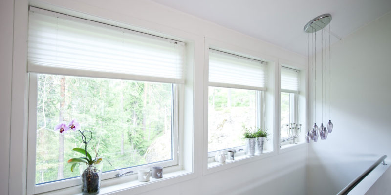 White fully reversible windows