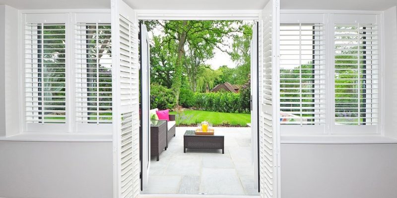 French doors with window shutters