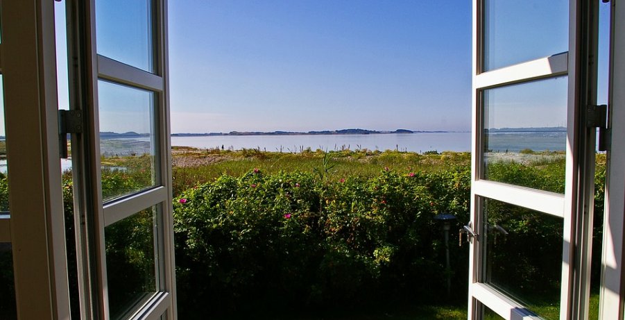 Open window looking out onto the sea