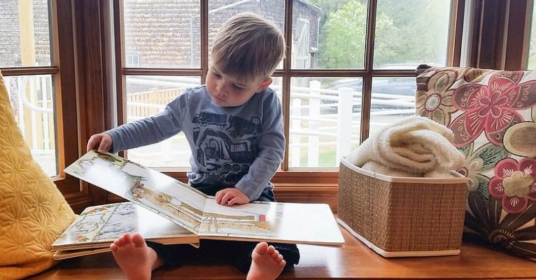 child sat in bay window