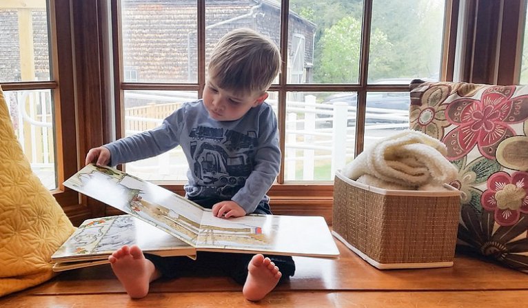 child sat in bay window