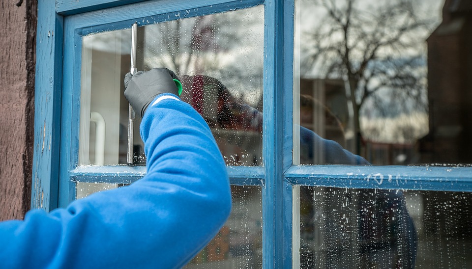 Cleaning a wooden window