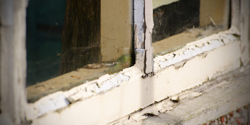 Old windows with peeling paint