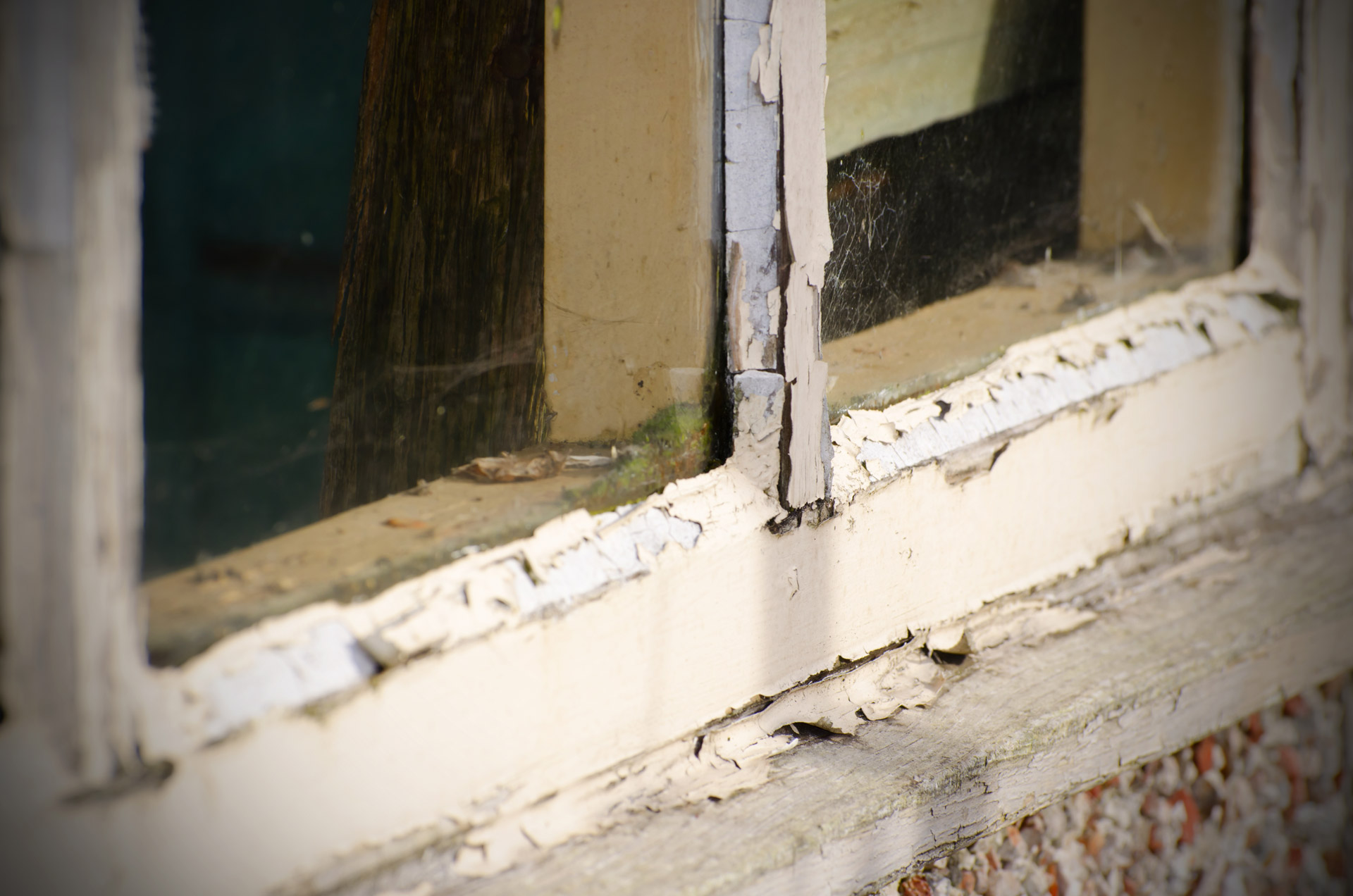 Old windows with peeling paint