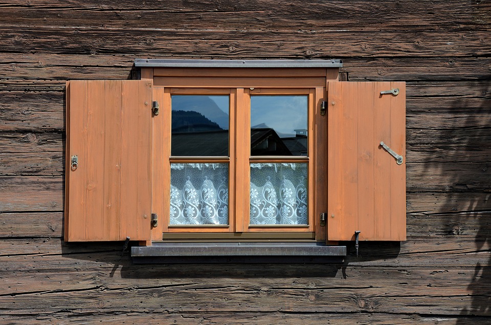 Wooden windows with shutters