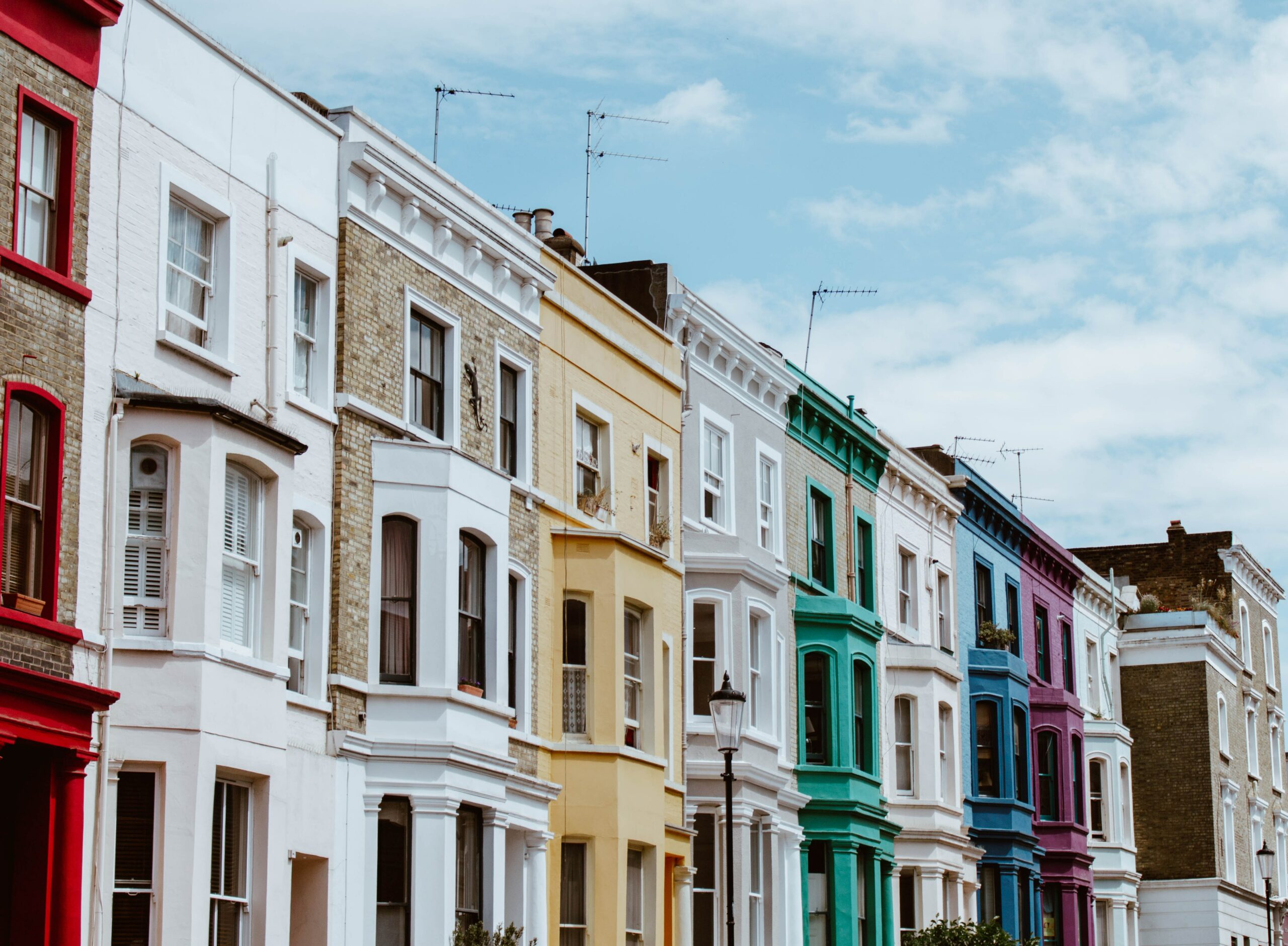 row of Victorian houses in London with Victorian sash windows